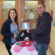 Laura and husband David going home with baby Audrey